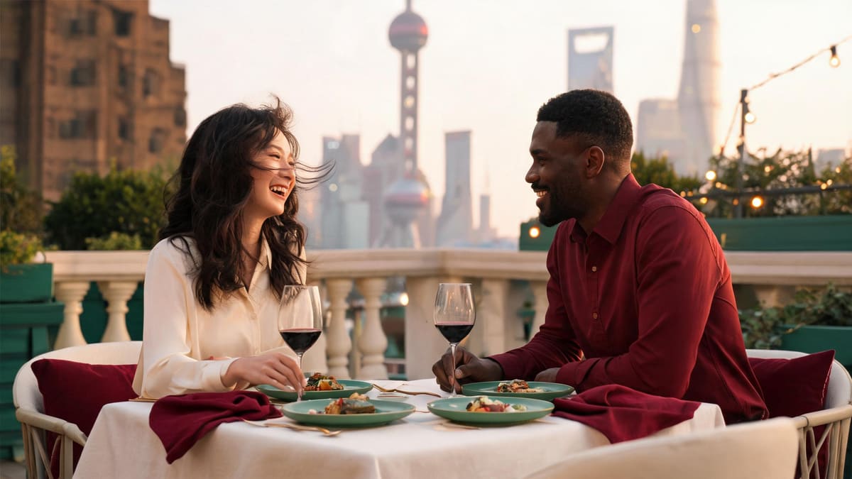 A couple lingering over a refined multi-course dinner at an elegant Shanghai restaurant, celadon plates and red wine