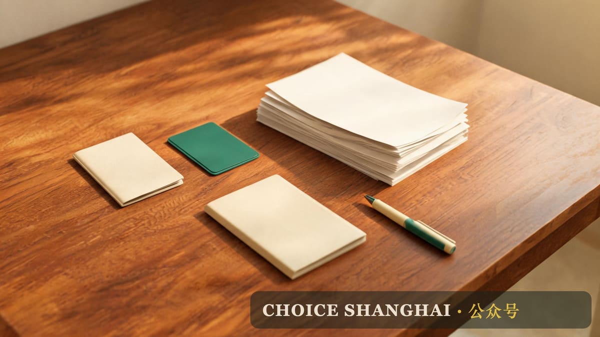 A child's passport, a Shanghai residence permit and a tenancy lease on a desk