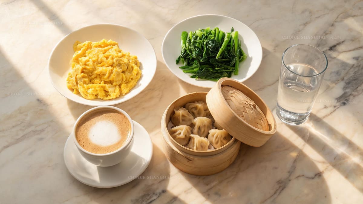 An overhead spread of a Shanghai weekend brunch, eggs, greens, dumplings and coffee on a marble table