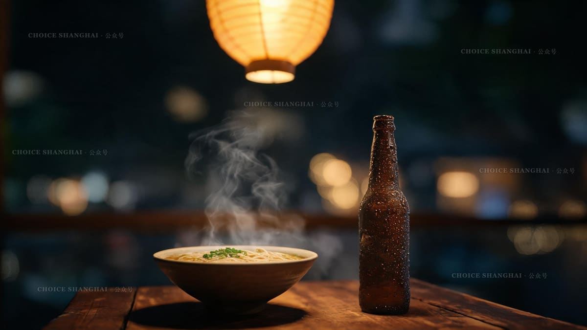 A steaming bowl of late-night noodles and a cold bottle of beer on a street-food table in Shanghai