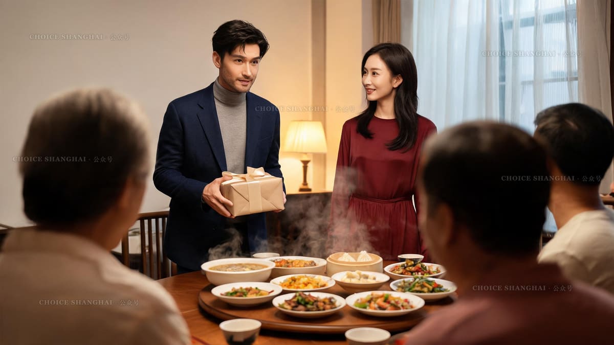 A boyfriend offers a wrapped gift with both hands at a Shanghai family dinner table while his partner smiles beside him