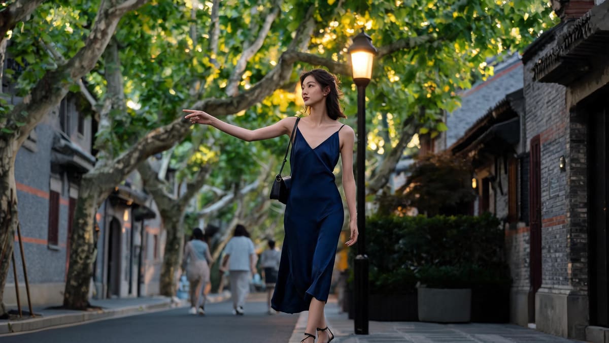 A woman at home on her own leafy Shanghai lane in the early evening, giving directions