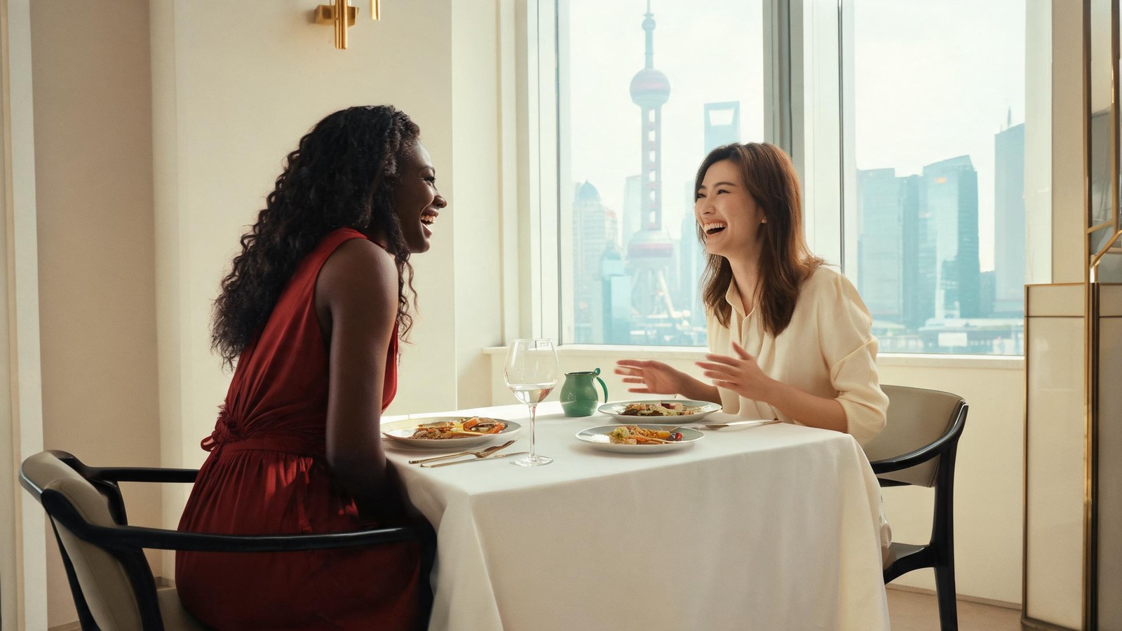 Two friends over a long set lunch in a bright Shanghai dining room with Pudong skyline views