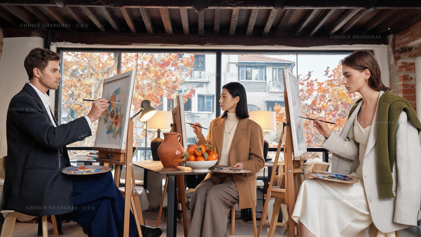 Three people painting a still life of autumn persimmons at easels in a Shanghai loft art studio