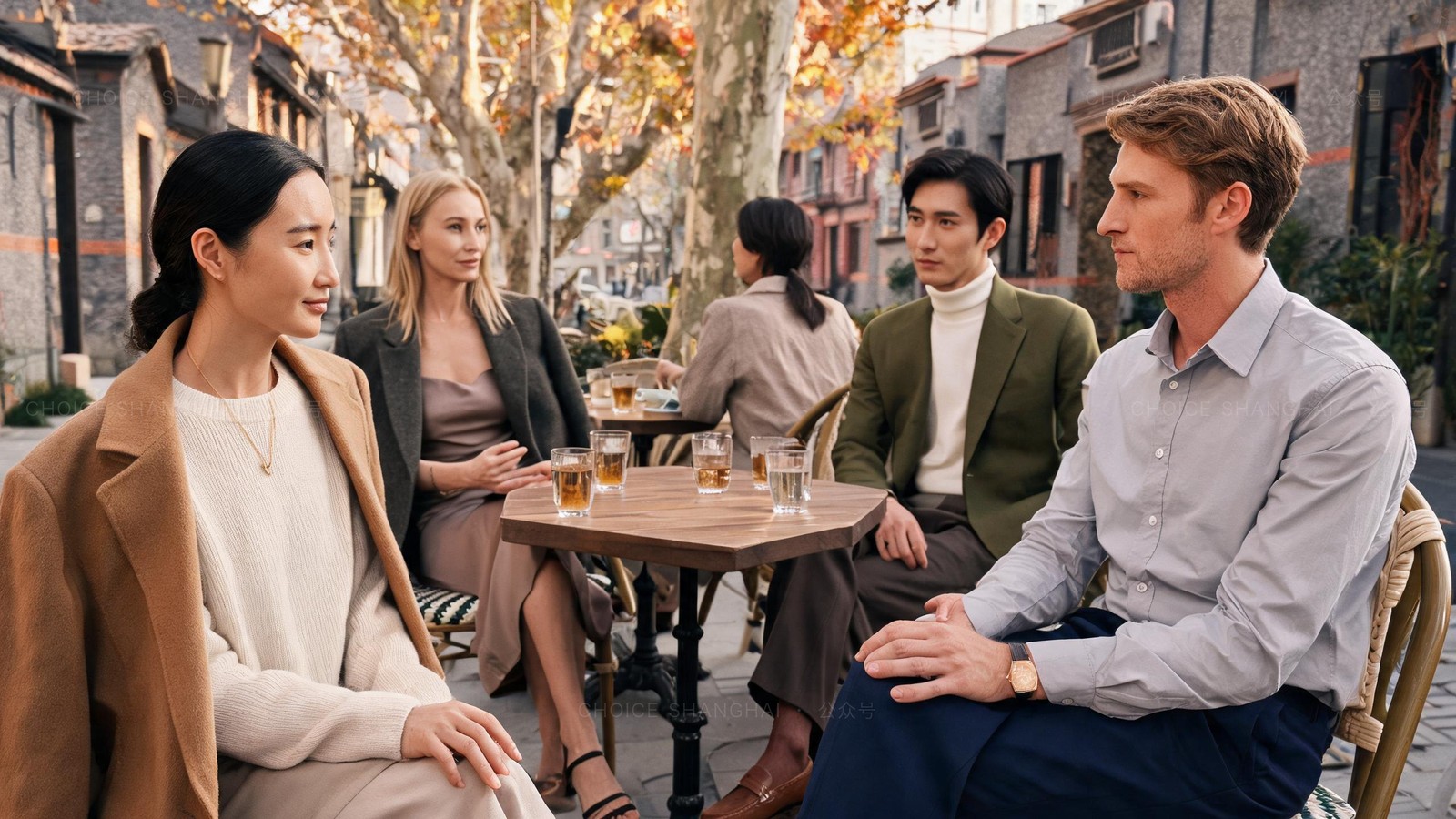 A warm diverse group of expats and locals talking around an outdoor table at a Shanghai community meetup on an autumn afternoon